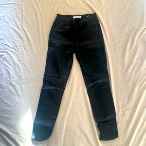Black Coated KanCan skinny jeans. Size 27.
